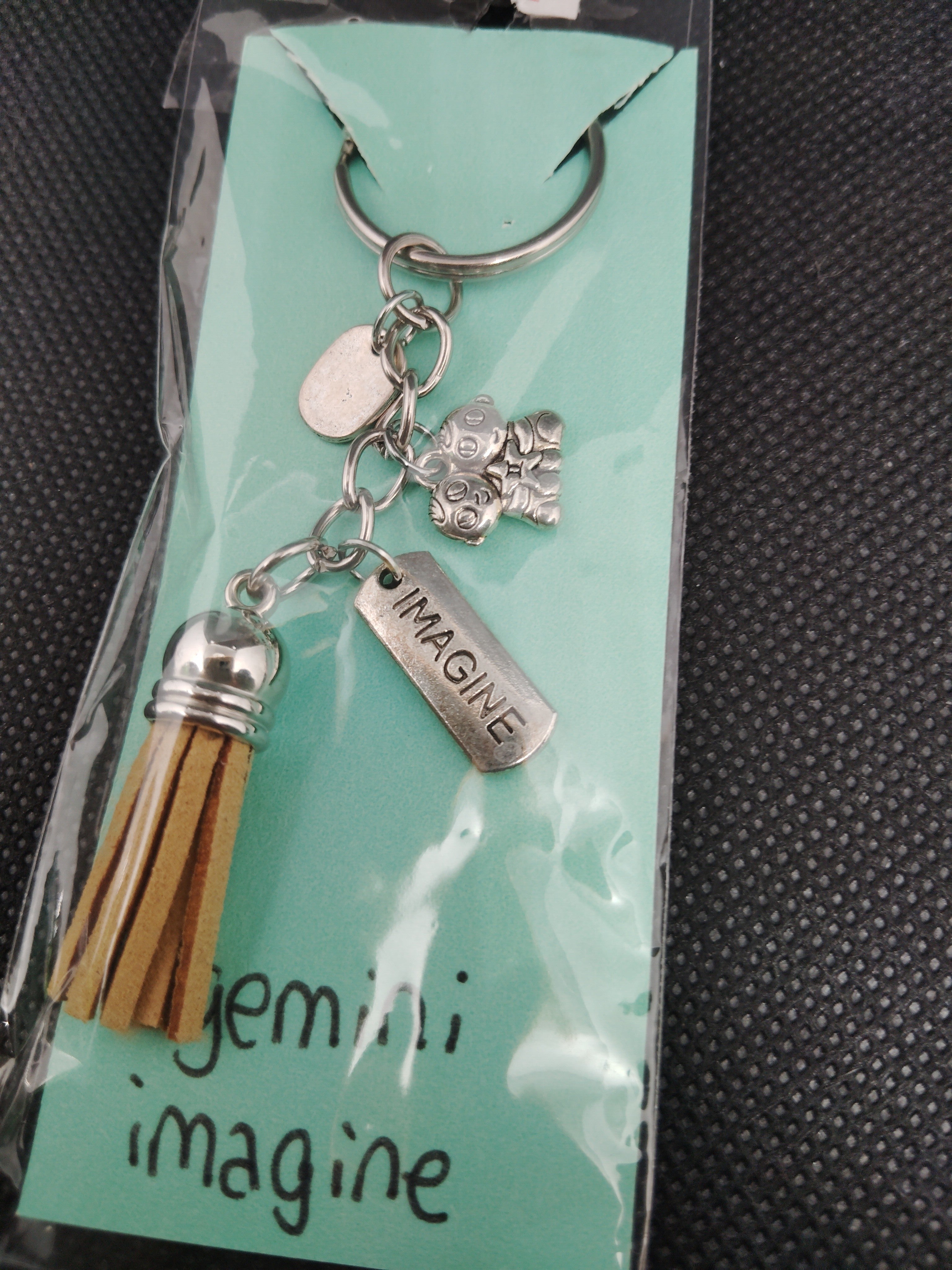 Let your imagination soar with this Gemini inspired key chain
