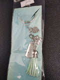 Fearless and fabulous, this keychain is a reminder to embrace life