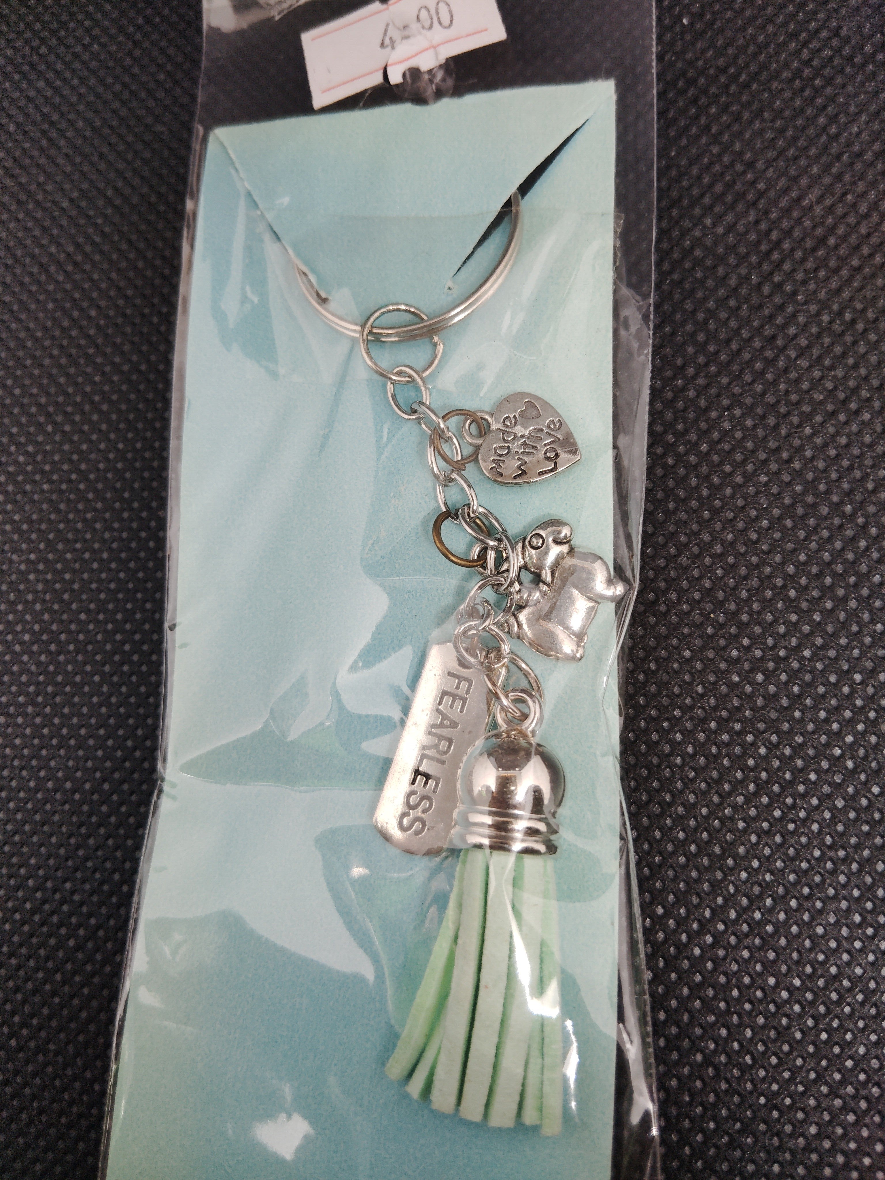 Fearless and fabulous, this keychain is a reminder to embrace life