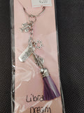 Dream big, Libra! This keychain is a reminder to balance your dreams with reality