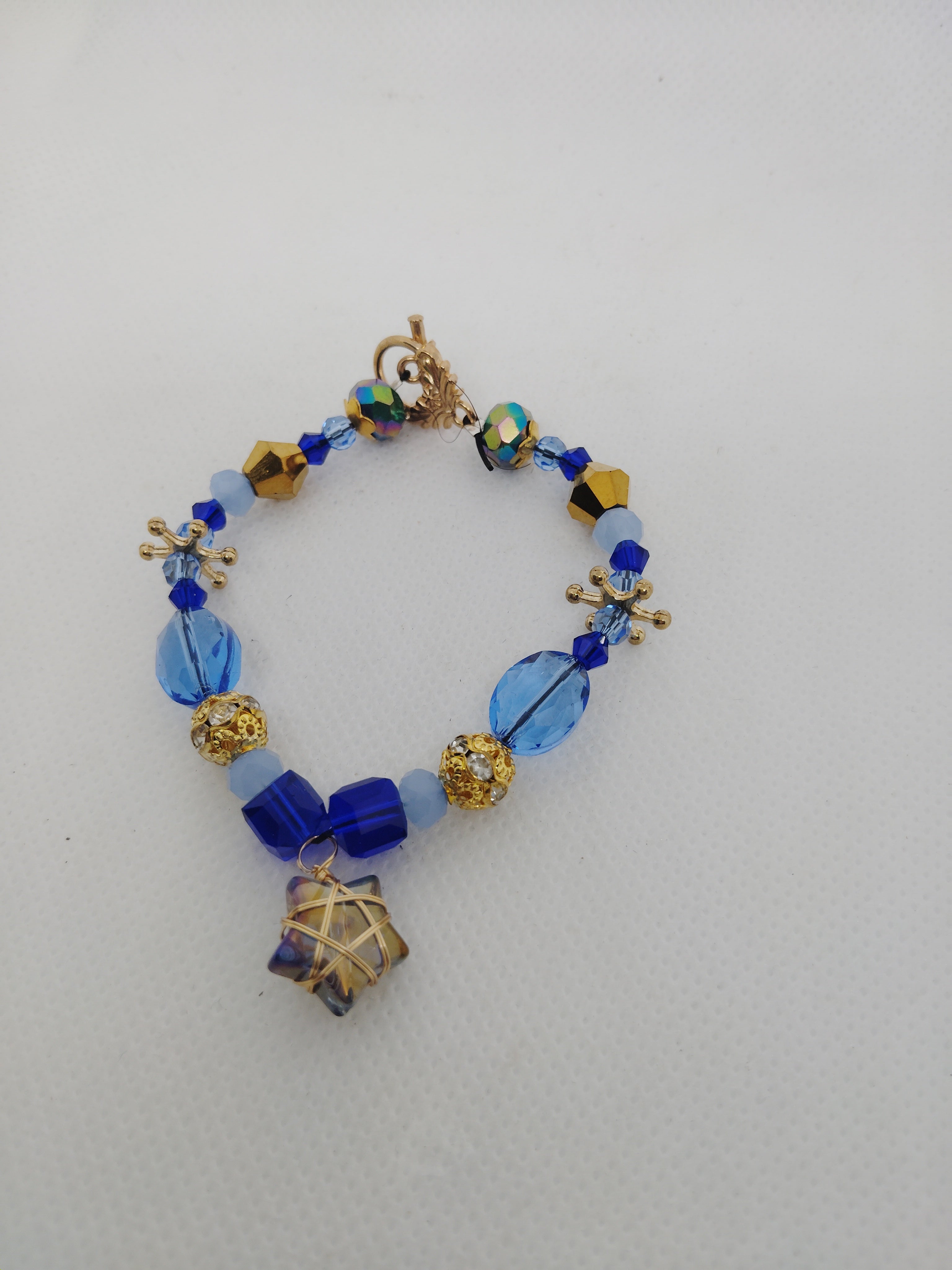 Blue and Gold Beaded Bracelet with Wire Wrapped Star Charm
