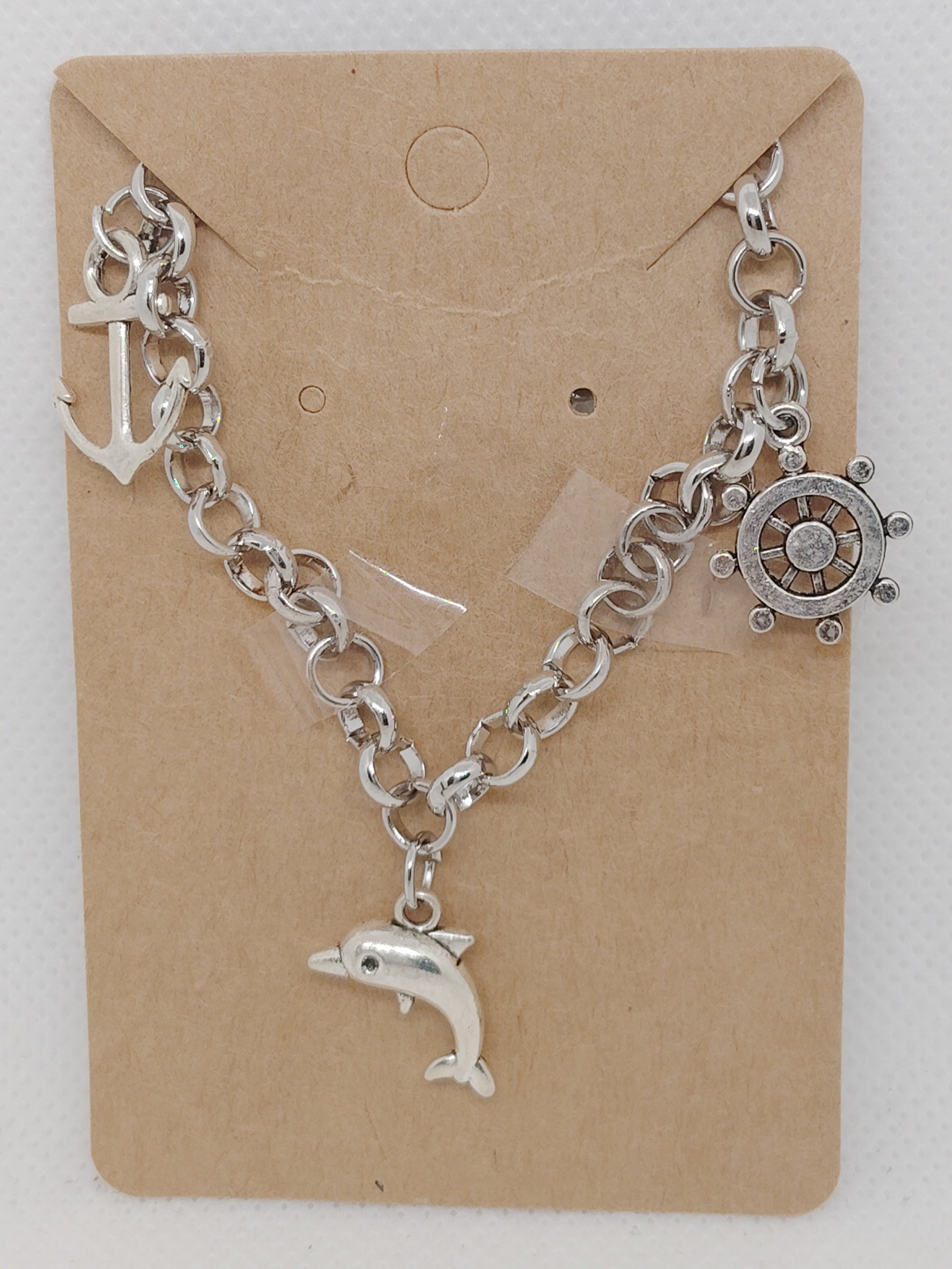 Nautical Themed Bracelet with Anchor, Dolphin, and Ship Wheel Charms